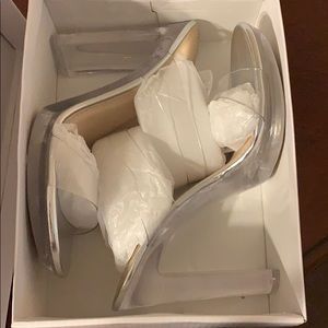 Clear shoes still in box brand new!